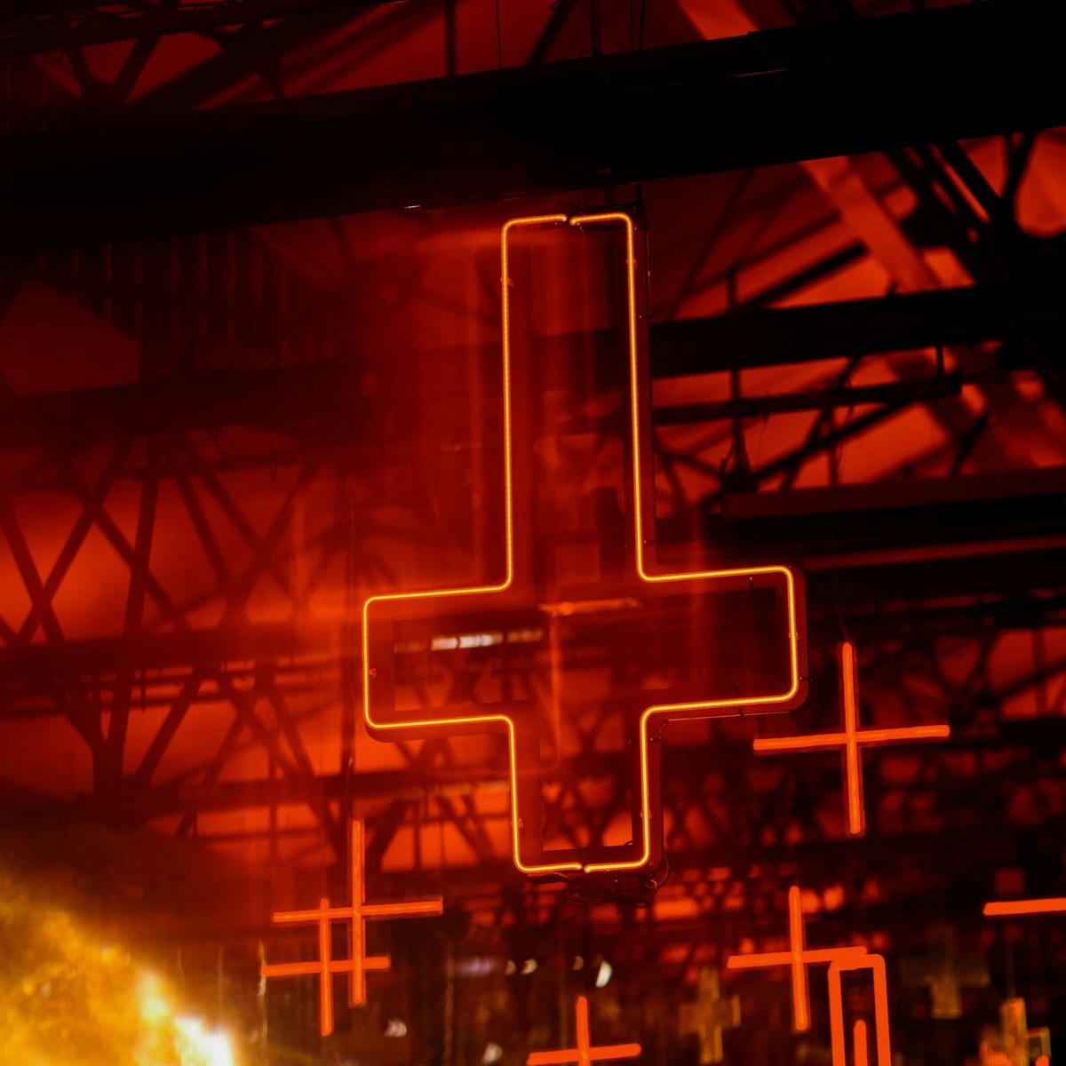 Neon red crossing in a ceiling structure